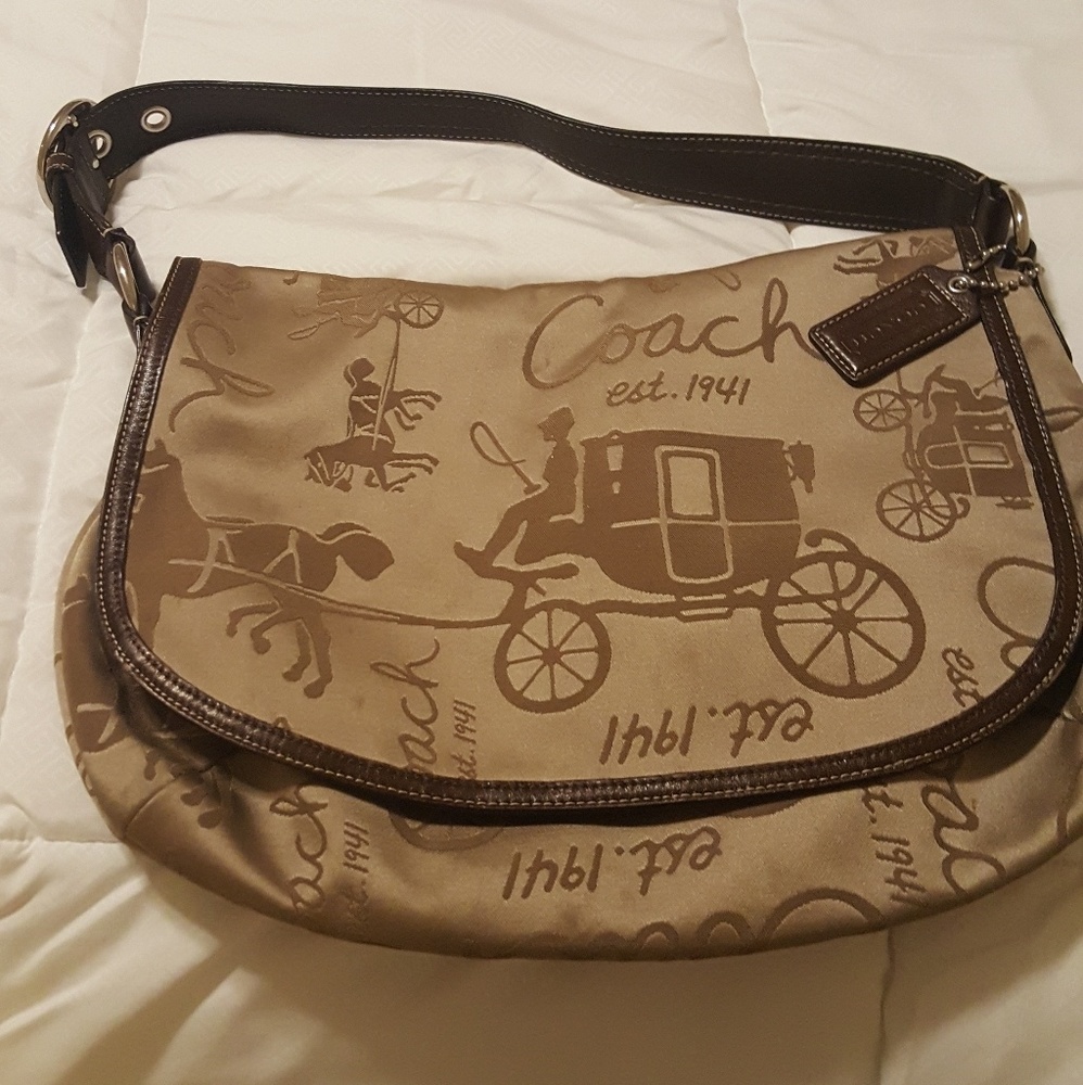 Authentic coach purse with stagecoach design